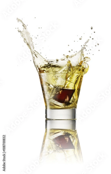 Fototapeta Splash in alcoholic drink on white background