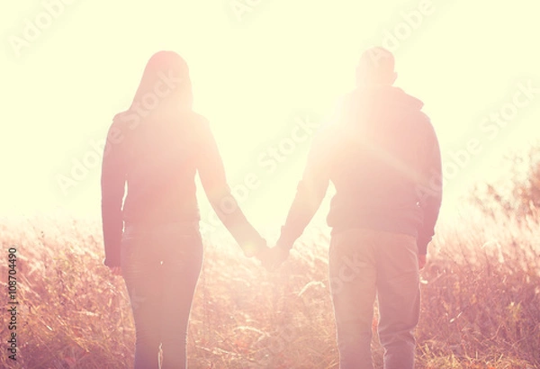 Fototapeta Happy young couple playing park resting summer and spring, fresh air enjoy the emotional Dourges each other's hands