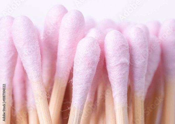 Obraz Heap of bamboo pink cotton swabs on white background