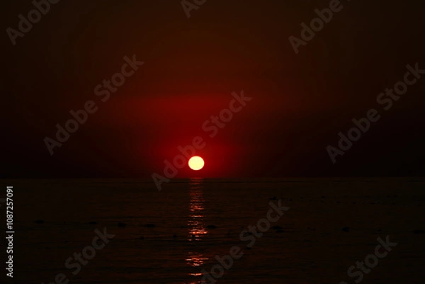 Obraz Sunset reflecting on the ocean