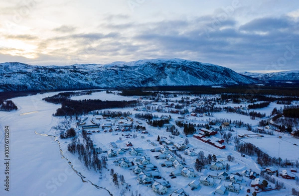 Obraz Alta, Norway. Aerial view of small northern town Alta, Norway in winter. Aerial with houses, river and mountain in the evening