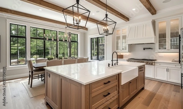 Fototapeta Traditional kitchen in beautiful new luxury home with hardwood floors, wood beams, and large island quartz counters. Includes farmhouse sink, elegant pendant lights, and large, Generative AI