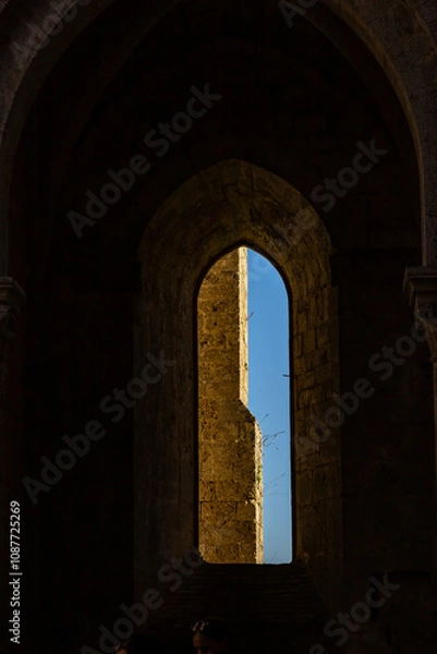 Fototapeta remains of San Galgano Abbey, a Cistercian monastery from the Middle Ages built in Chiusdino, a Tuscany countryside village in Central Italy