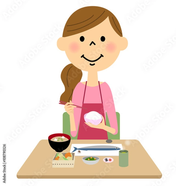 Fototapeta ご飯を食べるエプロンの女性