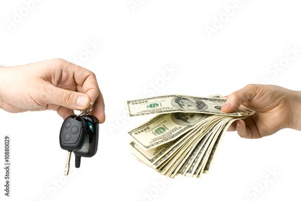 Fototapeta Hand with money and car keys