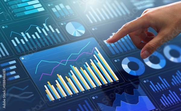 Fototapeta Data analytics dashboard of business marketing or finance. Analyst touching growth graph.