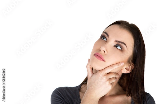 Obraz Contemplative thinking woman at a white background Stock Image