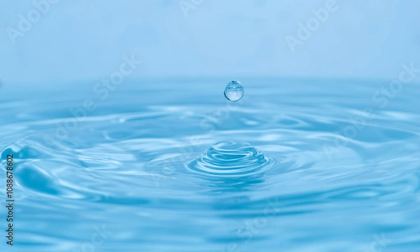 Fototapeta 美しい水しぶき　水面と雫