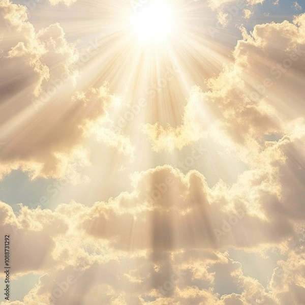 Obraz A bright sun shining through fluffy clouds in a clear blue sky.