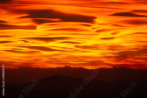 Fototapeta Lenticular clouds at sunset Amazing natural phenomena