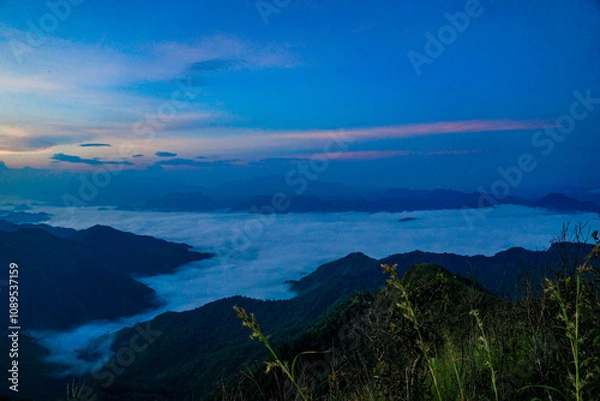 Obraz Sunrise over misty mountains scenic landscape nature photography tranquil environment aerial view serenity in nature