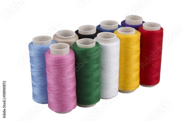 Fototapeta Bobbins with threads