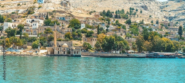Fototapeta Sanliurfa Halfeti. A photograph taken from a distance of the Sunken Great Mosque located on the water in Halfeti.