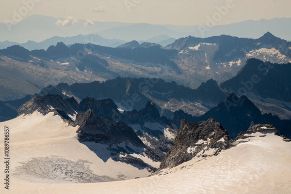 Fototapeta Mountain landscape frome above the summit of Adamello and view on the mountain range of Adamello Park, Italian alps, Lombardy, Italy