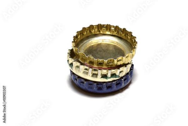 Obraz Three bottlecaps isolated on white background with shadow.