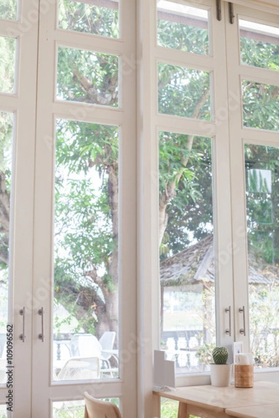 Fototapeta Window with a view of the garden