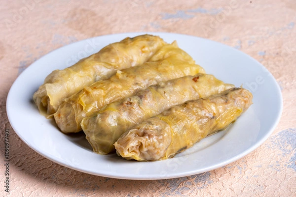 Obraz Cabbage wrap. Turkish food traditional stuffing.Cabbage leaf meat filling.