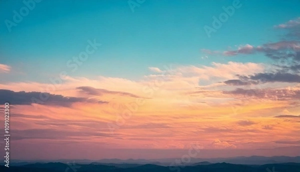 Obraz オレンジと青空のグラデーション 夕方 夕焼け 魅惑的 幻想的