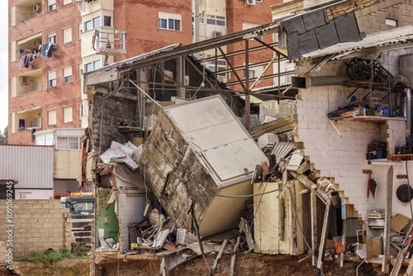 Fototapeta Buildings half destroyed by the flood in the Poyo ravine caused by the intense rains of the Dana over the Valencian Community