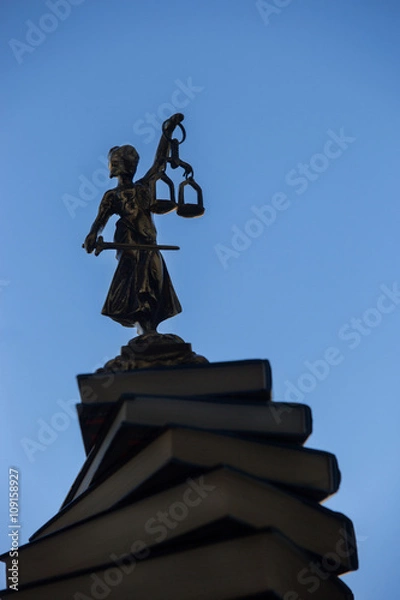 Obraz Lady Justice - Temida - Themis, Lady of Justice on a background of blue sky 
