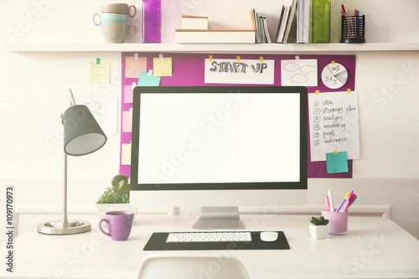 Fototapeta Stylish workplace with computer and interior decorations