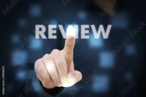 Obraz Businessman touching Review