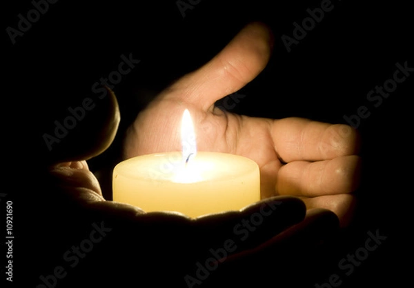 Obraz Human hands holding candle