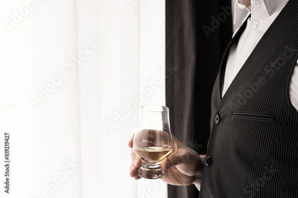 Obraz Business Man drinking Whiskey