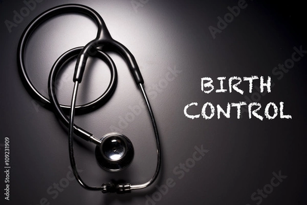 Fototapeta "Birth Control" word with stethoscope on background - health concept. Medical conceptual