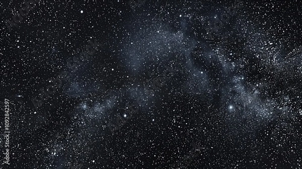 Fototapeta A starry night sky with white stars and nebulae.