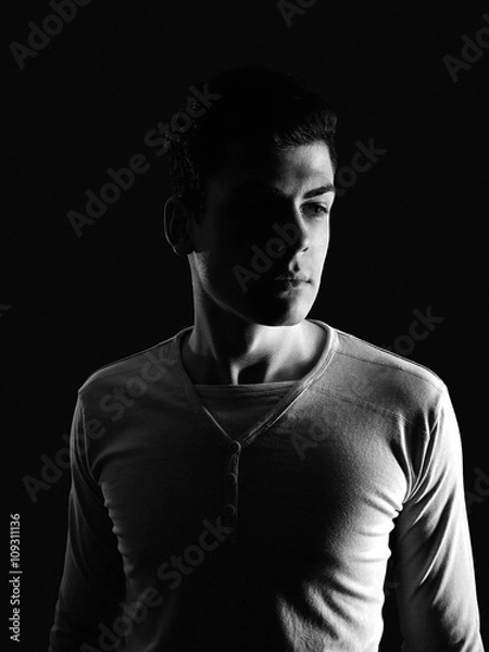 Obraz stylish young man portrait in low-key
