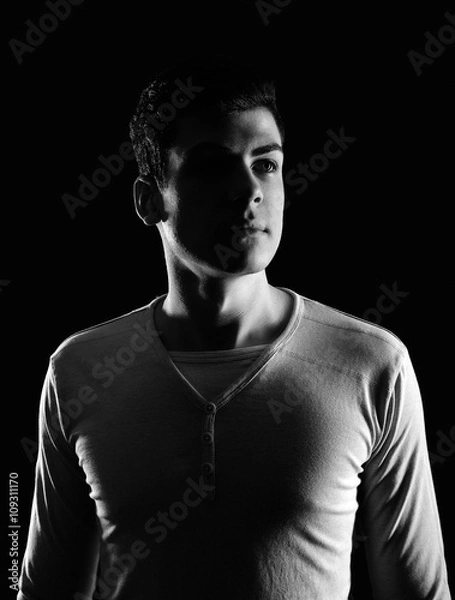Obraz stylish young man portrait in low-key
