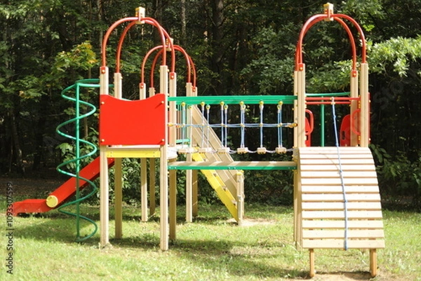 Obraz A playground in the park. A place to play. A playground in the park for children to play.