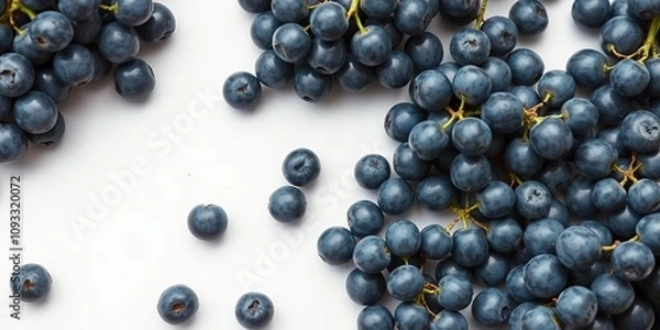 Obraz Blue wet grapes laid out in a pattern on a white surface with a clean and minimalist aesthetic, geometric patterns, edible, pattern