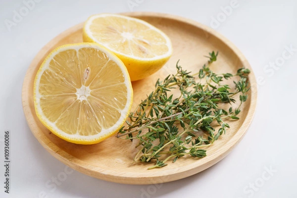 Fototapeta lemon and thyme on white background