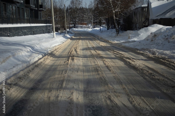 Obraz Road in the snow. Skid on the road. Transportation highway after a snowstorm.