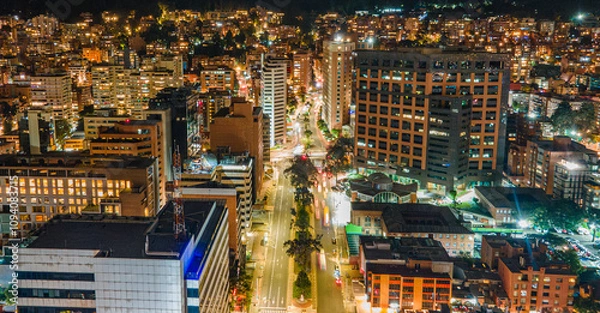 Fototapeta Nighttime Cityscape of Bogotá, Colombia: A Stunning View of Modern Architecture and Urban Life