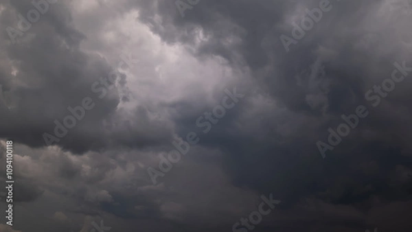 Fototapeta Dark sky with stormy clouds. Dramatic sky rain,Dark clouds before a thunder-storm.