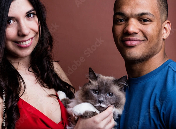Fototapeta woman man and cat and here is the family