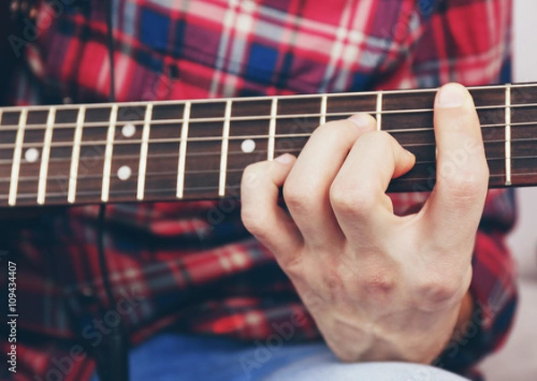 Fototapeta Man with guitar closeup