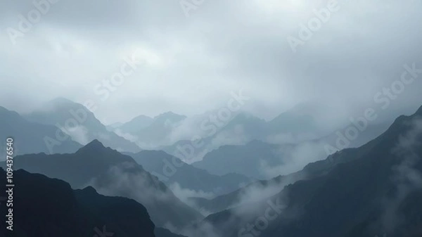 Fototapeta Dark misty mountains with rugged peaks and misty valleys, atmosphere, terrain, background