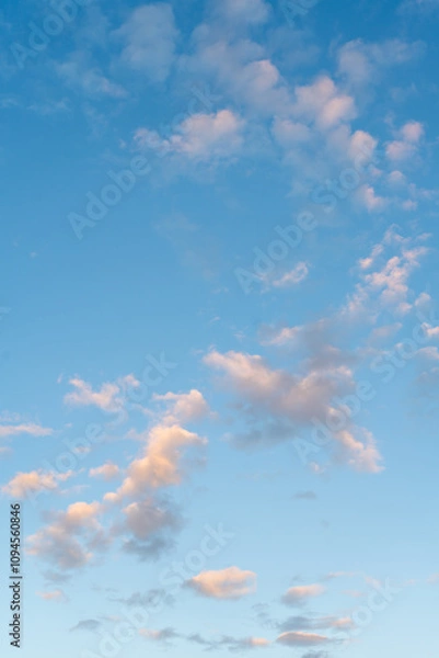 Obraz Blue sky and floating cotton clouds in sunlight