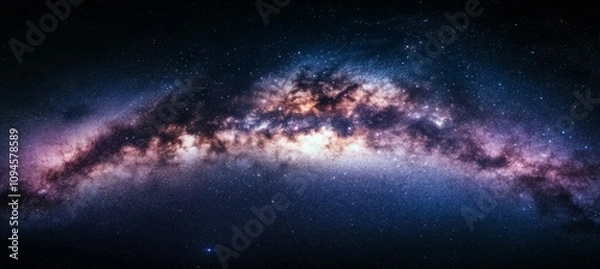 Fototapeta Colorful cosmic spiral showcasing vibrant hues and distant stars in the night sky