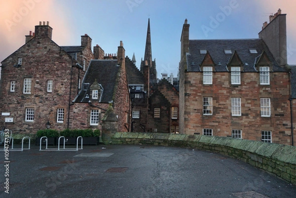 Fototapeta Edinburgh , Scotland - November 22, 2024: The Royal Miles Street in the heart of Edinburgh old towns.