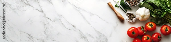 Fototapeta Vegetables on a clean kitchen marble counter top horizontal web header with copy space for text top down view of red and green vegetables banner