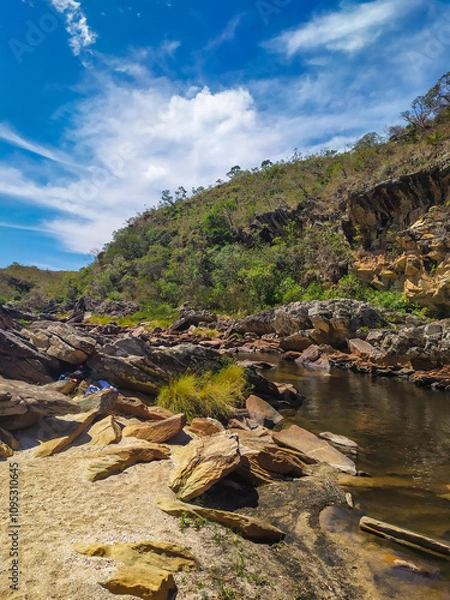 Fototapeta Nice region with river, calm water, good pools, clean beaches, all of them inside a mountain ridge called Serra do Cipo in Minas Gerais, Brazil.