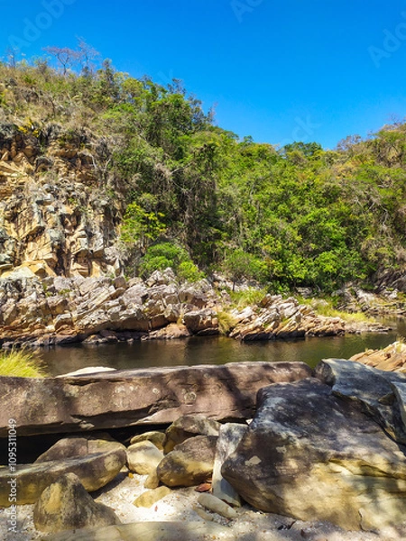 Fototapeta Nice region with river, calm water, good pools, clean beaches, all of them inside a mountain ridge called Serra do Cipo in Minas Gerais, Brazil.