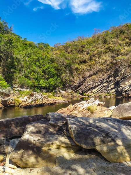 Fototapeta Nice region with river, calm water, good pools, clean beaches, all of them inside a mountain ridge called Serra do Cipo in Minas Gerais, Brazil.
