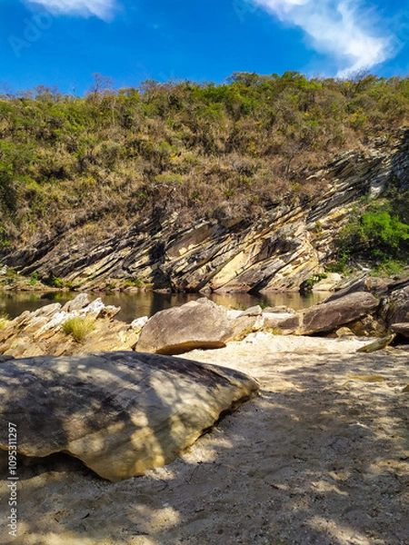Fototapeta Nice region with river, calm water, good pools, clean beaches, all of them inside a mountain ridge called Serra do Cipo in Minas Gerais, Brazil.