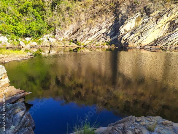 Fototapeta Nice region with river, calm water, good pools, clean beaches, all of them inside a mountain ridge called Serra do Cipo in Minas Gerais, Brazil.